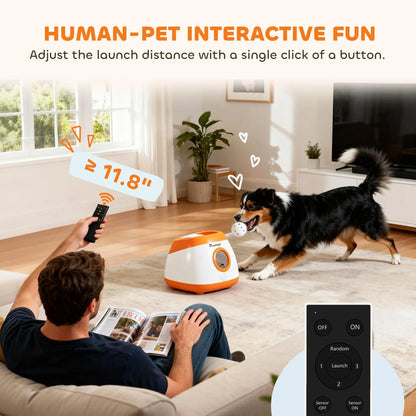 Orange ball launcher with remote controller, releasing a tennis ball indoors